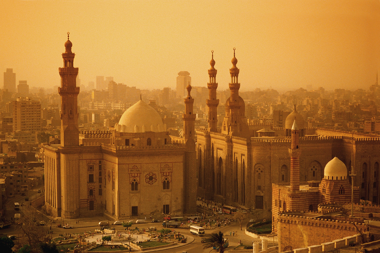 The 14th-century Mosque of Sultan Hasan (l), next to the Mosque of al-Rifa'i (r), which was begun in the 19th century. 1869-1911 Cairo, Egypt